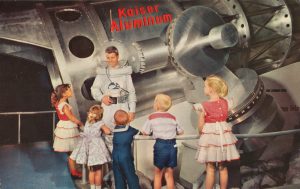 Children standing around the Kaiser Aluminum exhibition in Tommorowland at Disneyland. 