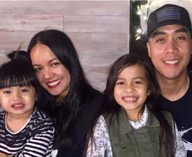 Matt Medina with his wife and two young children