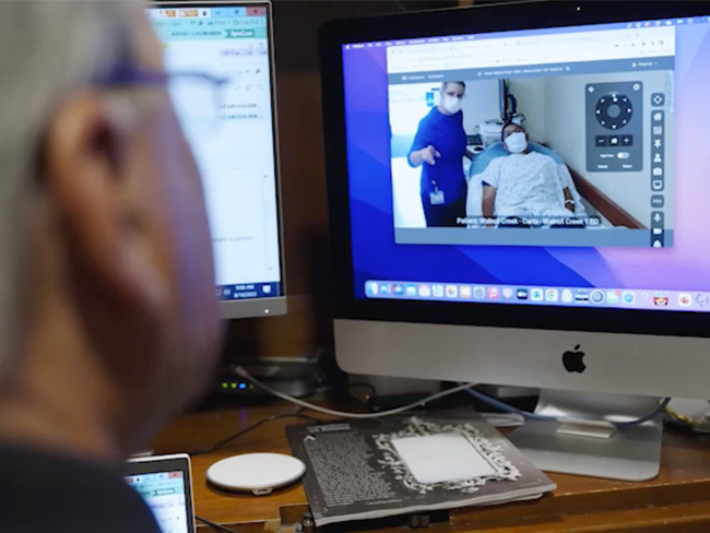 computer screen showing a patient having a telehealth appointment
