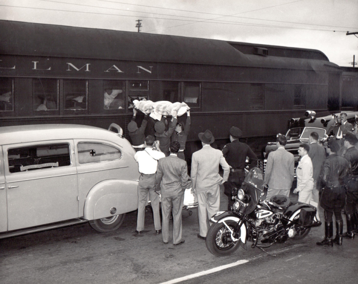 United Mine Workers of America patients arriving by Pullman train for Kaiser physical therapy, 1948.
