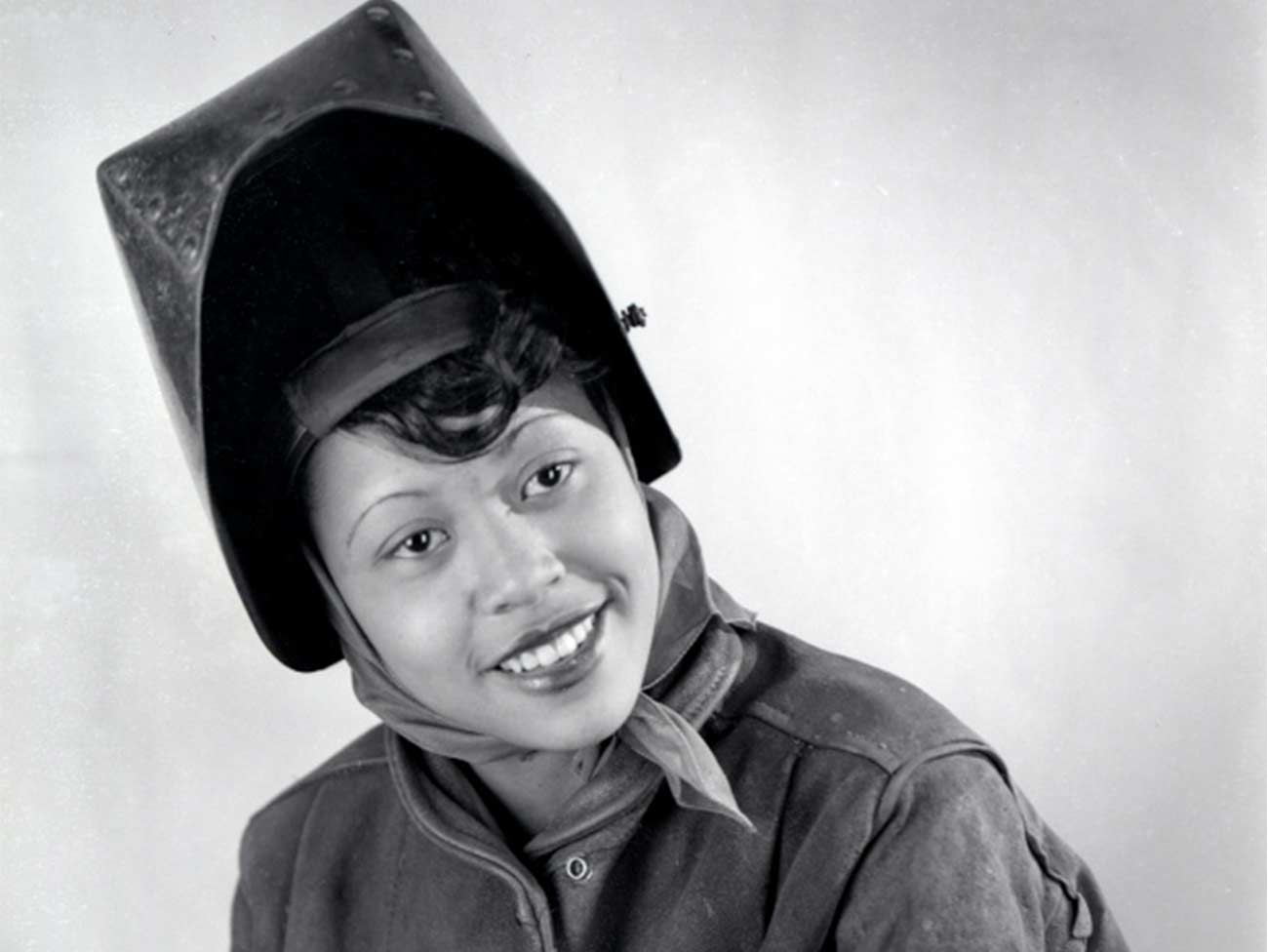 1944 picture of Gladys Theus, welder in Kaiser Richmond shipyard in her welding gear.