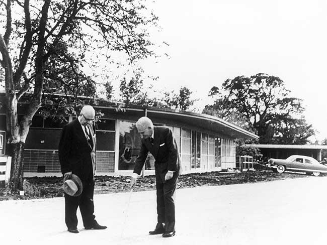 Henry J. Kaiser and Sidney R. Garfield, MD, survey the site for the Walnut Creek Medical Center, completed in 1953.