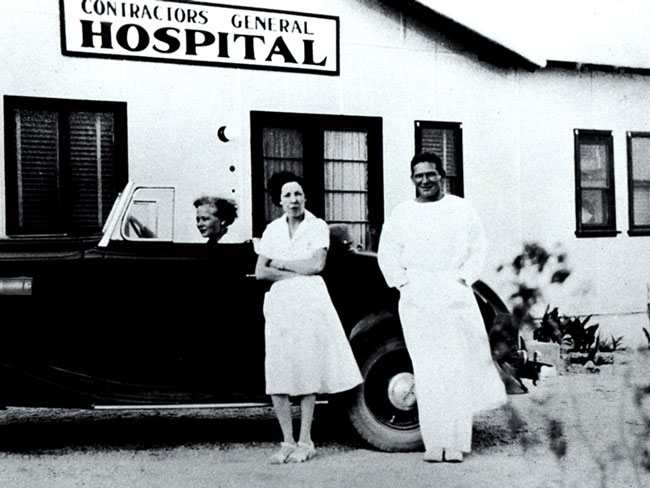 Nurse Betty Runyen (in car), with Dr. Sidney Garfield, at Contractors General Hospital, circa 1934