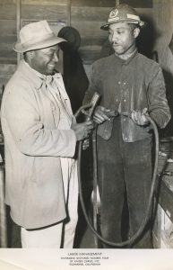 1944 image of two black workers at the Kaiser Richmond shipyard.