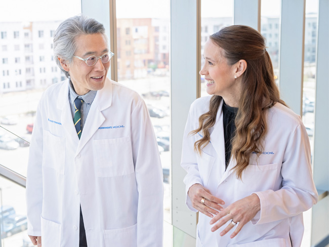 2 physicians talking