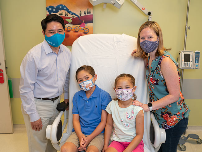 Family wearing face masks while at the Kaiser Permanente Los Angeles Medical Center 