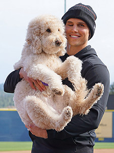 man holding dog