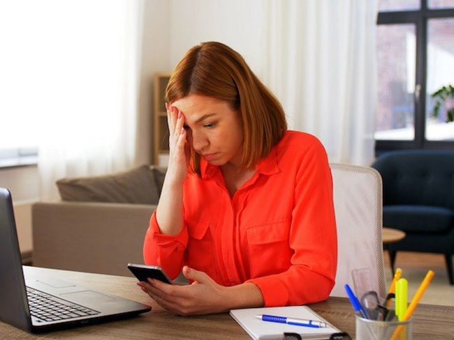 Frustrated woman on the phone