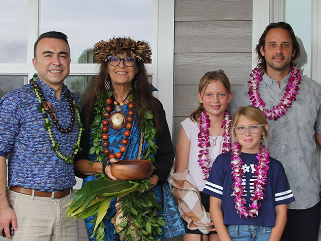 Dr. Choucair joins Dr. Mouery and his family at a house blessing ceremony