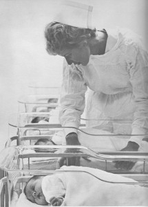 A maternity nurse tends to newborns at a KP hospital, circa 1965.