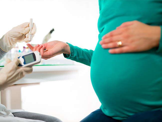 Pregnant woman getting a blood test for gestational diabetes
