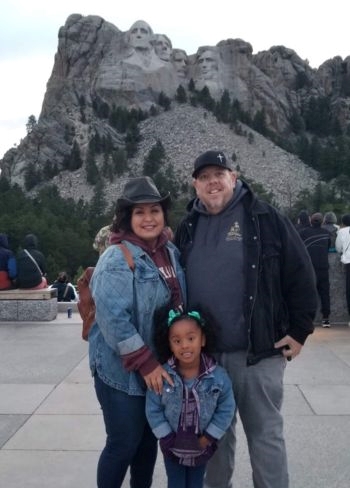 Cardosi family standing in front of Mount Rushmore