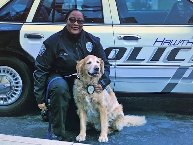 Lameka Bell with K-9 dog