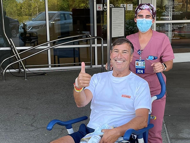 Mark Frey leaves hospital after knee replacement surgery.