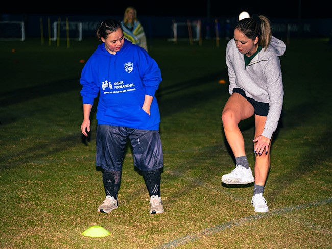 Rebecca Brewer and Emilee Mason practicing soccer drills