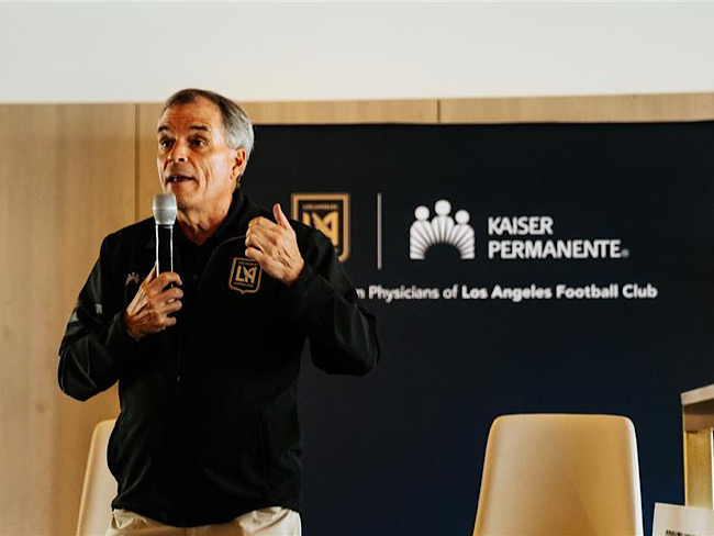 Robert Sallis, MD, LAFC team physician, speaking at a workshop on student health and wellness.