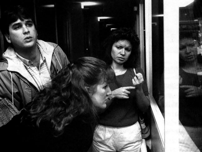 Jose and JoAnne Coelho, who are deaf, tour Portland, Oregon’s Bess Kaiser Medical Center in 1988 with interpreter Luann Cook.