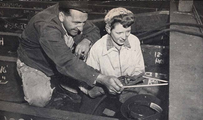 &quot;Pat Centola, welder leaderman, shows pretty June Beesley, welder trainee, how to use his new weapons of war.&quot; Fore 'n' Aft, October 1, 1942