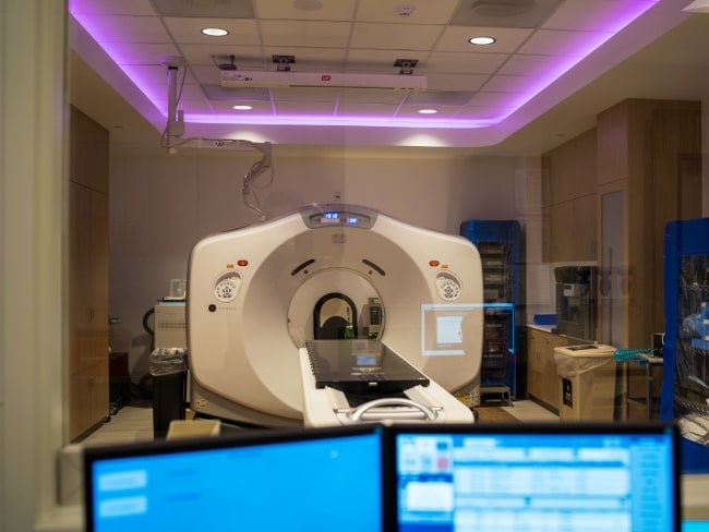 View of a CT scanner from inside the control room in a treatment suite at Bellflower Radiation Oncology Center