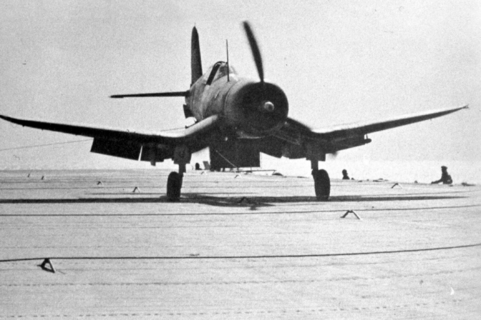 Brewster F3A-1 Corsair landing on a WWII aircraft carrier.