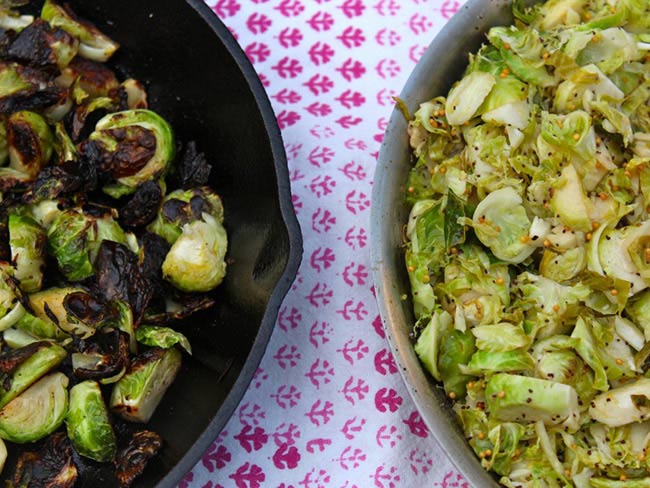 Brussels sprouts cooked 2 different ways in 2 different bowls