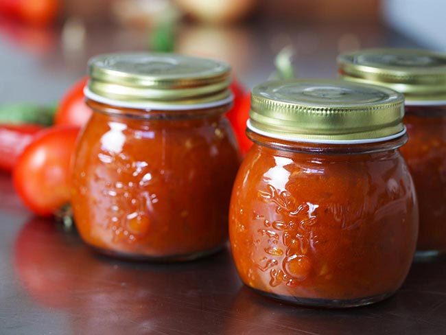 Jars of homemade tomato chutney.