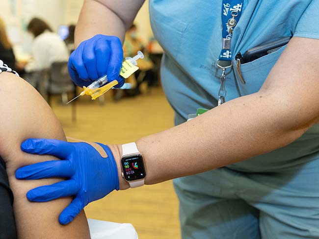 Close up of vaccine being given in a patient's arm.